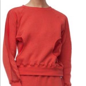 Good American crew neck sweatshirt with mesh panels